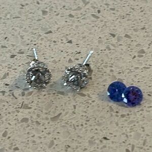 Beautiful silver topaz accent halo earrings and created tanzanite JTV